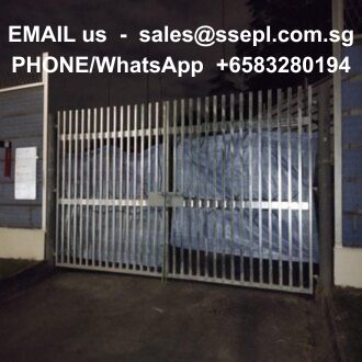 Metal double gate at a building entrance with white contact text overlay: 'EMAIL us - sales@ssepl.com.sg PHONE/WhatsApp +65 83280194'.
