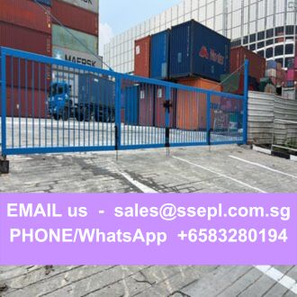 Container yard behind a blue gate with a purple banner reading: 'EMAIL us - sales@ssespl.com.sg PHONE/WhatsApp +6583280194'
