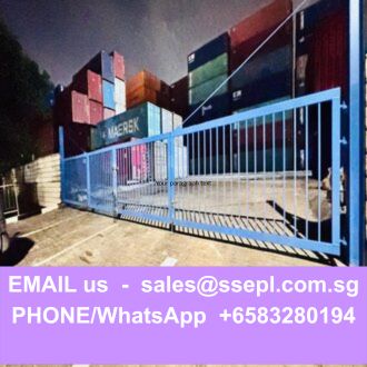 Blue gate in front of stacked shipping containers, with a purple banner across the bottom containing contact email and WhatsApp/phone number.
