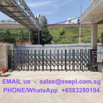Industrial site entrance with a foldable security gate; purple contact text reading 'EMAIL us - sales@ssepl.com.sg PHONE/WhatsApp +6583280194'