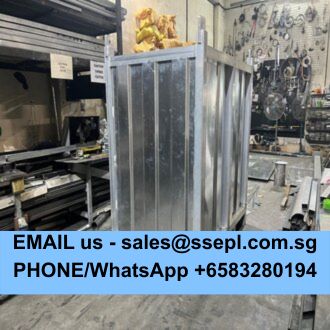 Industrial workshop with a tall metal-framed enclosure; a blue banner at the bottom shows contact info: EMAIL us - sales@ssepl.com.sg, PHONE/WhatsApp +6583280194.